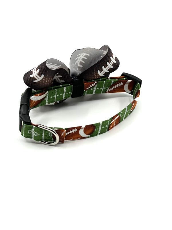 A dog collar with a football on it.