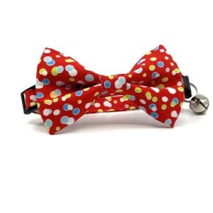 A red bow tie with polka dots on it.