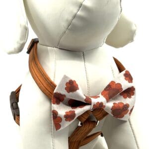 A stuffed animal wearing a bow tie.