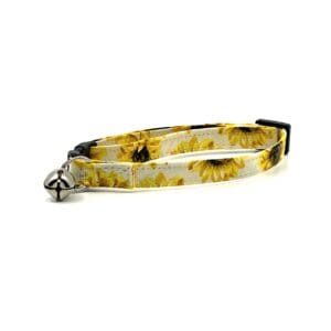 A cat collar with sunflowers on it.
