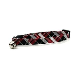 A black and red plaid cat collar with a bell.
