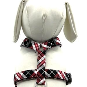 A white mannequin wearing a Red and Black Plaid Collar.