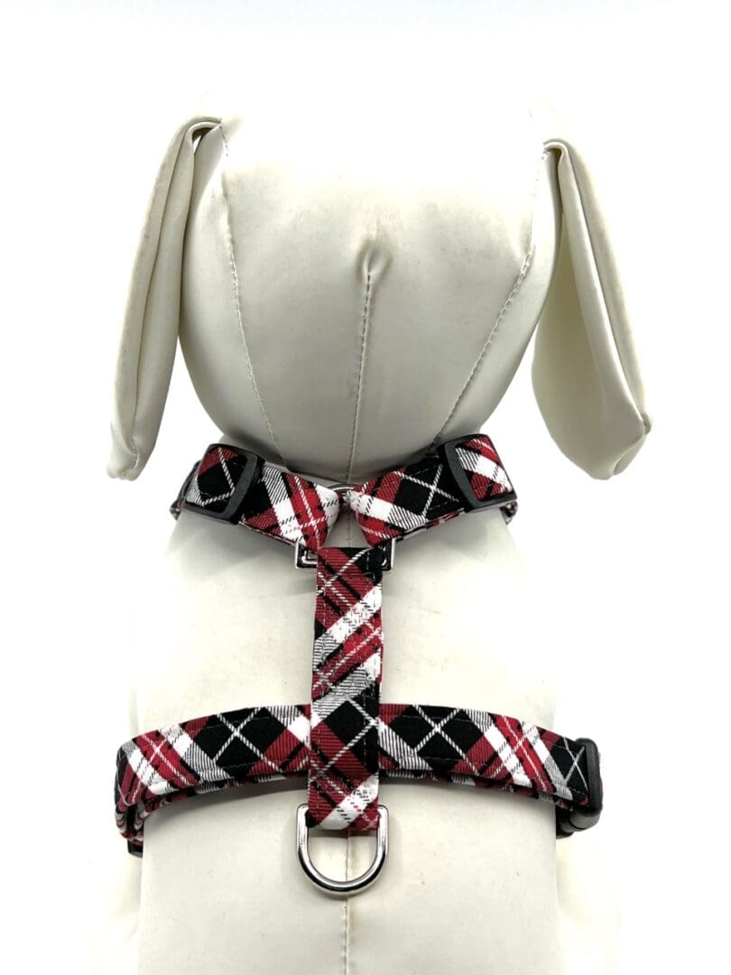 A white mannequin wearing a Red and Black Plaid Collar.