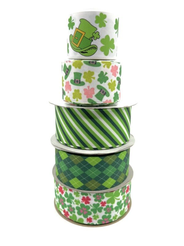 A stack of green and white ribbons with shamrocks.
