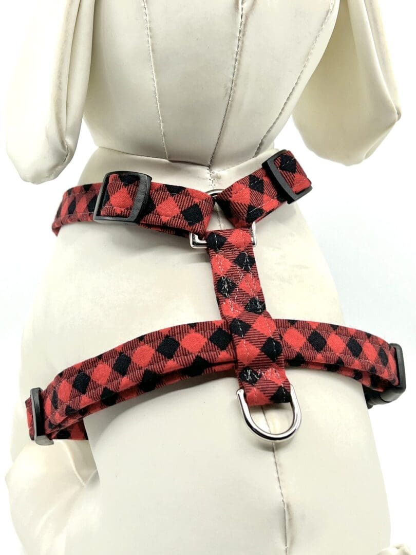Red and black plaid dog harness.