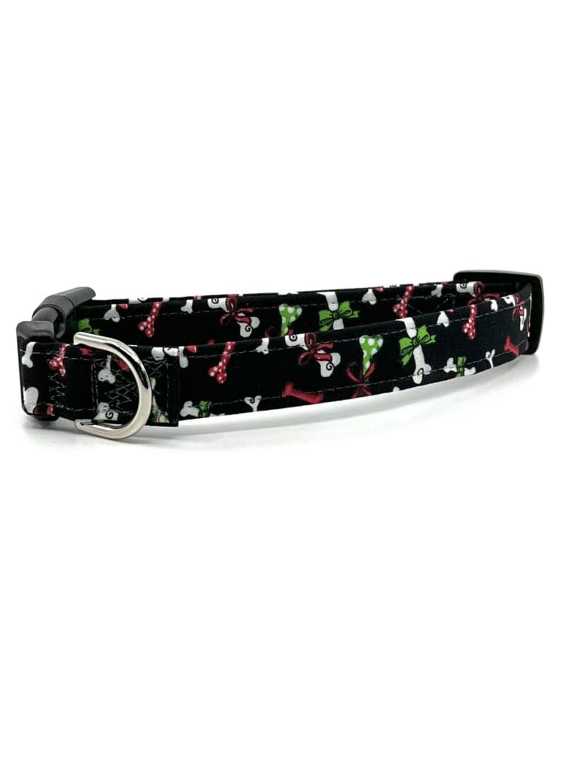 A dog collar with a picture of dogs on it.