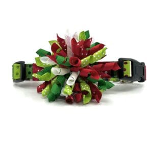 A red, green and white ribbon flower on a collar.