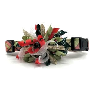 A dog collar with red, green, and black ribbons.