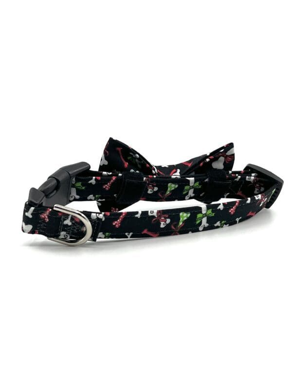A black collar with a bow tie on it