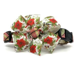 A bow that is made of fabric and has flowers.