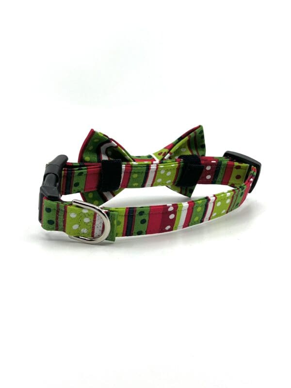 A green and red striped bow tie collar for dogs.