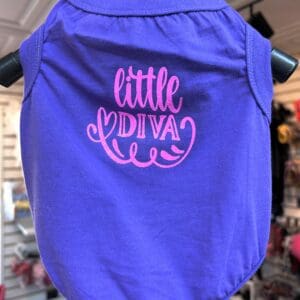 A purple shirt with the words " little diva ".