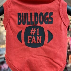 A red shirt with the bulldogs number one fan on it.