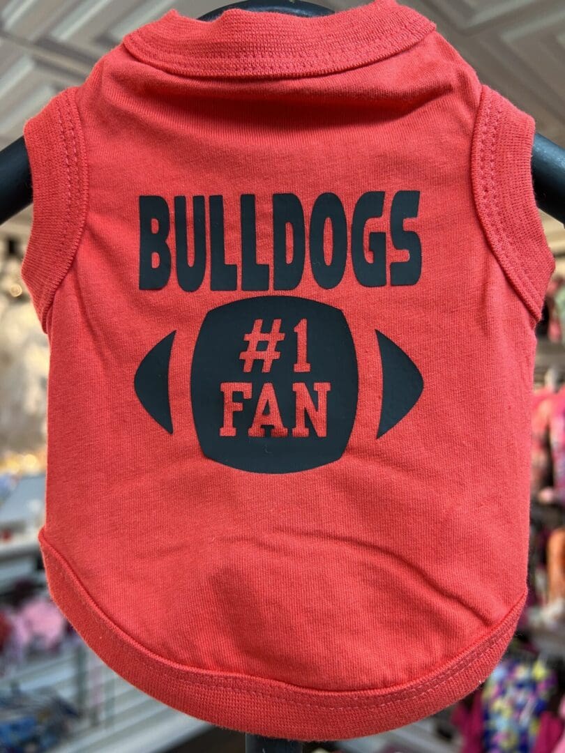 A red shirt with the bulldogs number one fan on it.
