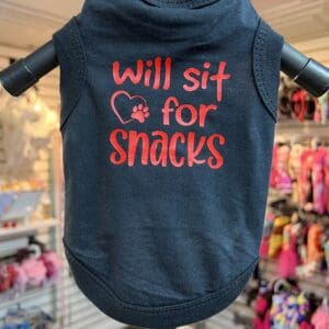 A black shirt that says " will sit for snacks ".