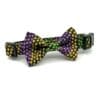A bow tie that is in the shape of a heart.