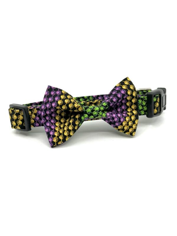 A bow tie that is in the shape of a heart.