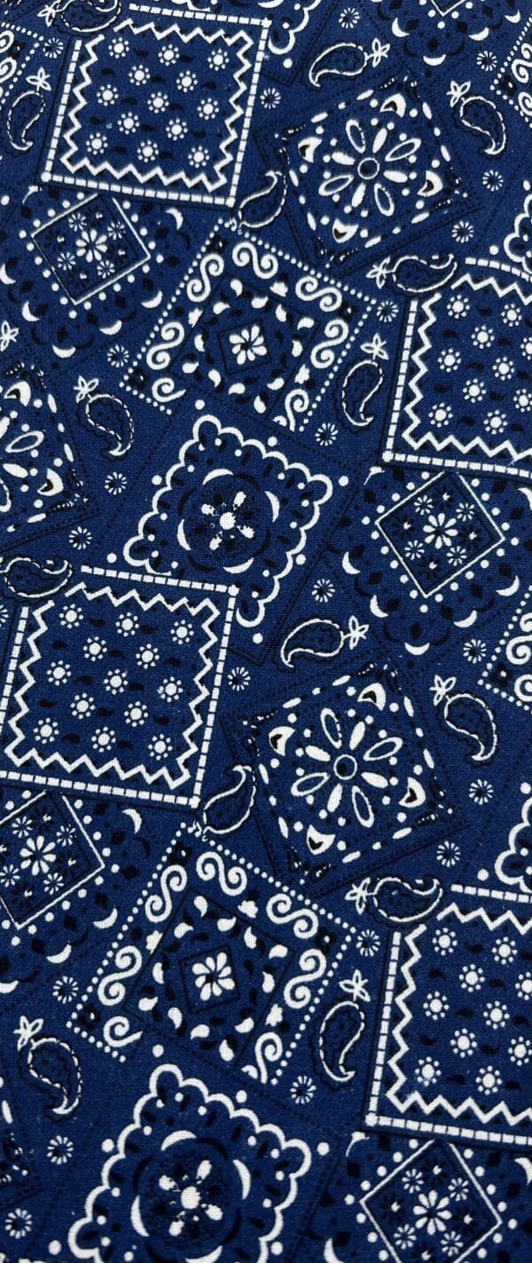 A close up of the blue and white pattern on a bandana.