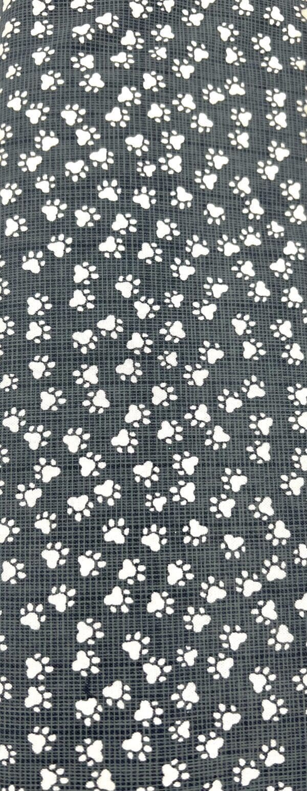 A close up of the paw prints on the fabric