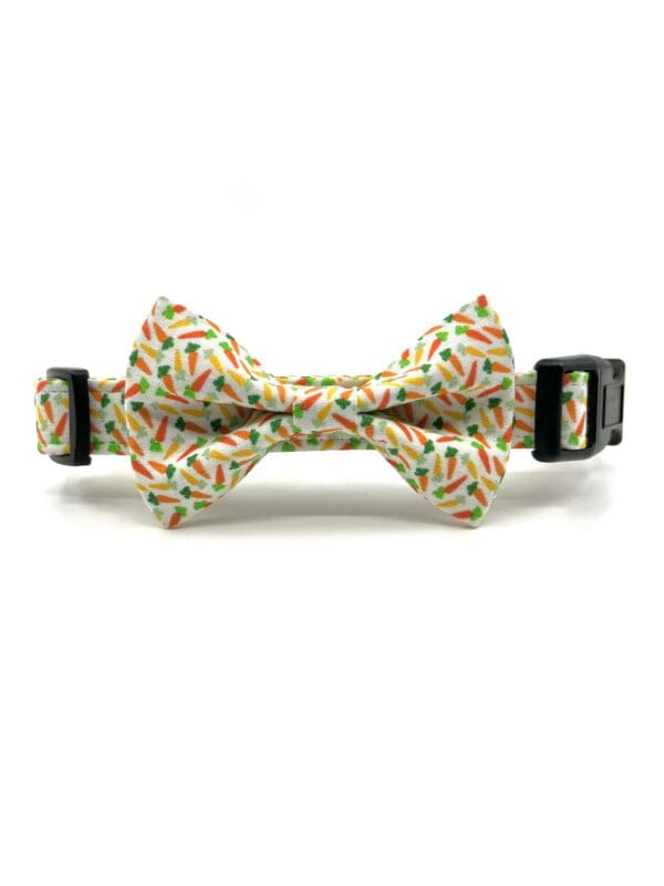 A bow tie that is on top of a collar.