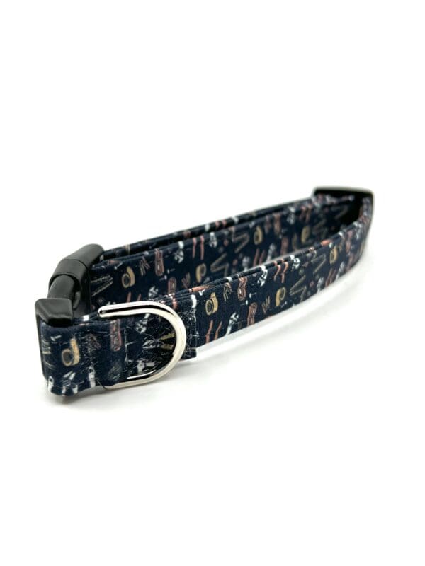 A dog collar with different types of dogs on it.