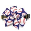 A blue and white bow with baseball balls on it