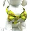 A bow tie with a softball pattern on it.