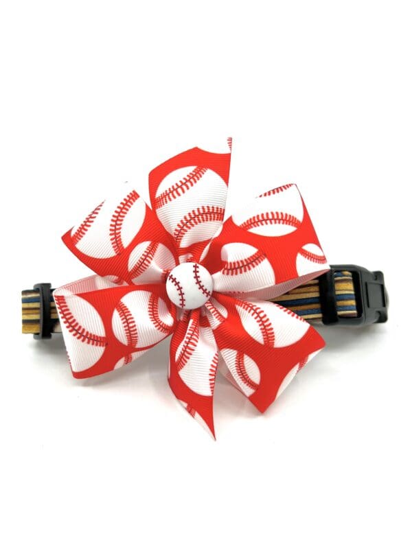 A red and white bow with baseball laces.