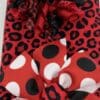 A red and black polka dot bow tie with leopard print.