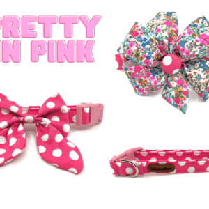 A pink bow tie and some other bows