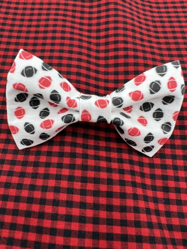 A bow tie with football pattern on it