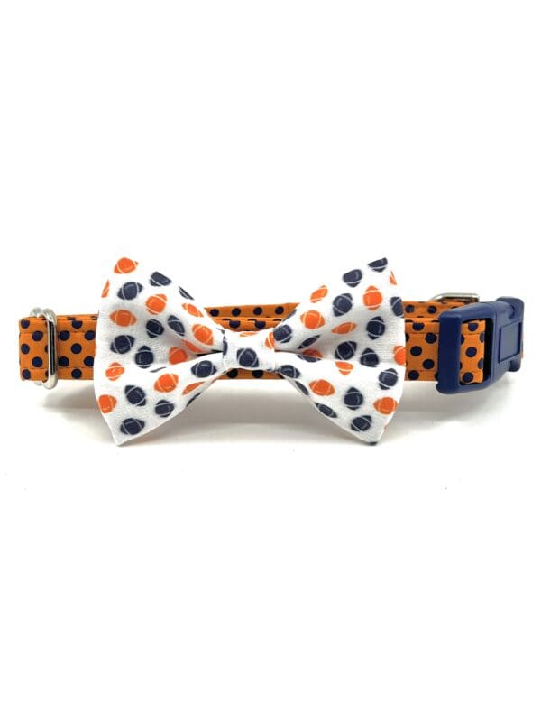 A dog collar with a bow tie on it.