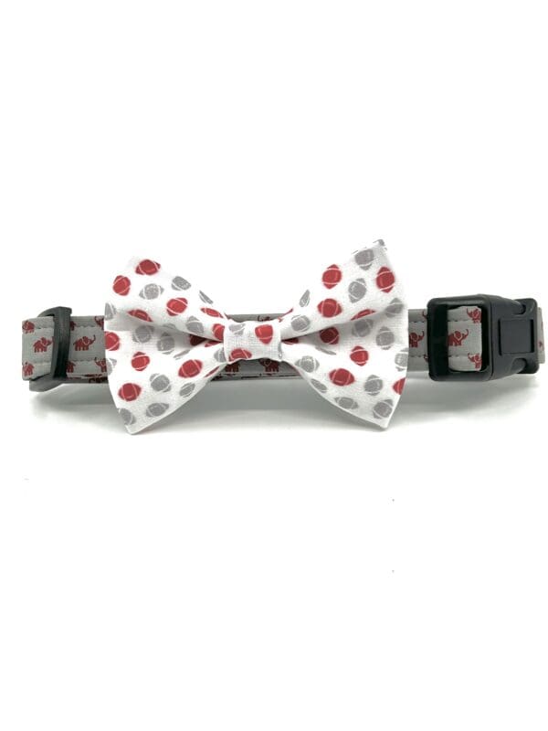 A red and white polka dot bow tie collar.