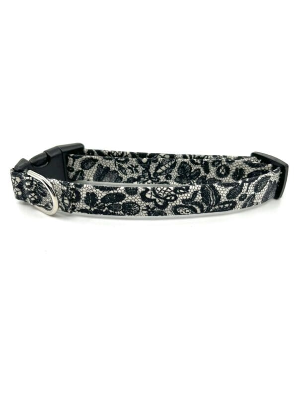 A black and white leopard print dog collar.