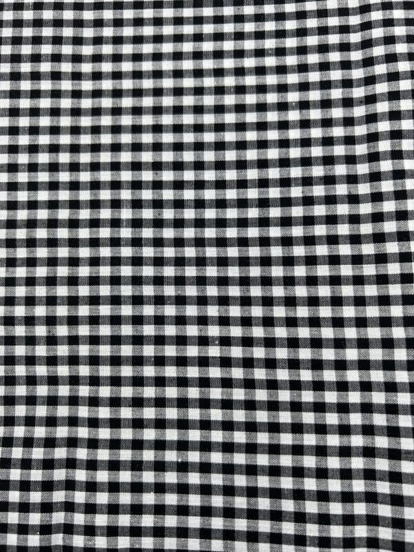 A black and white checkered fabric is shown.