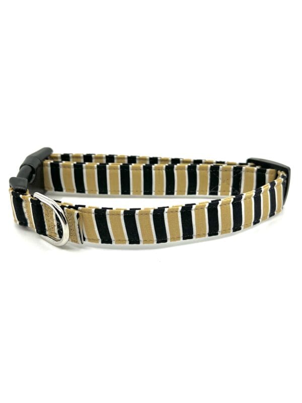 A black and tan striped dog collar.