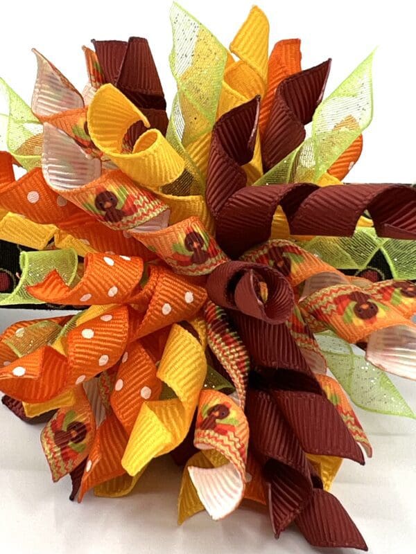 A close up of the ribbon on a wreath