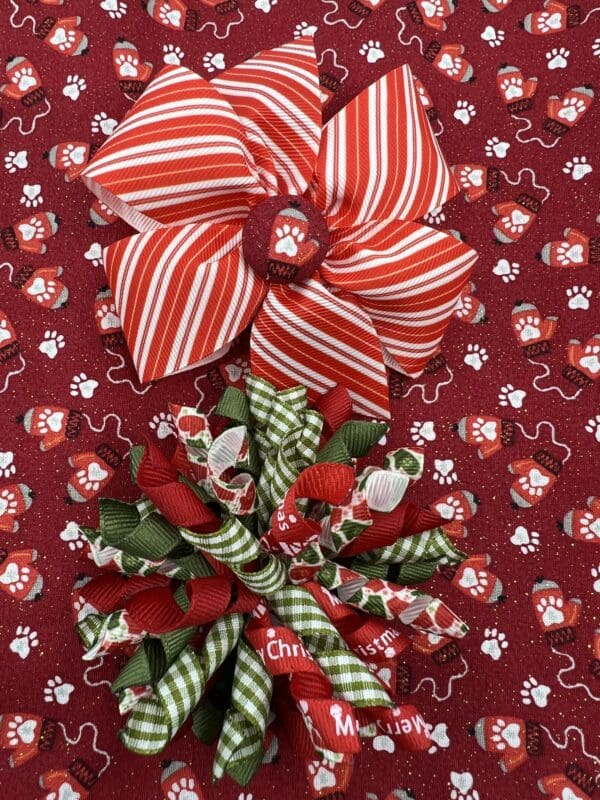 Two christmas bows on a red background.