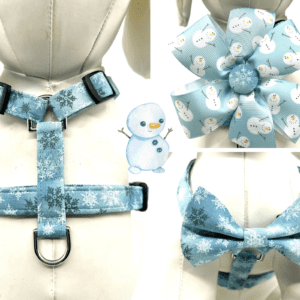 A blue dog harness with a snowflake on it.
