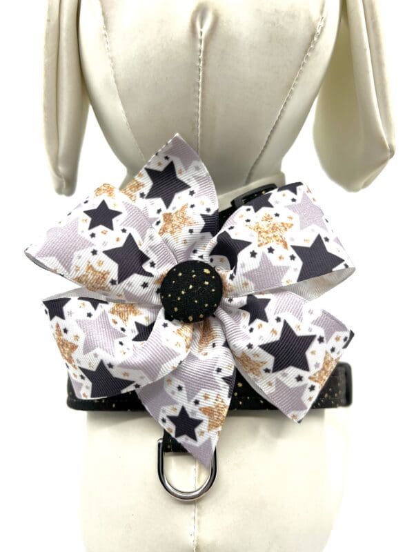 A black and white dog collar with a star print.