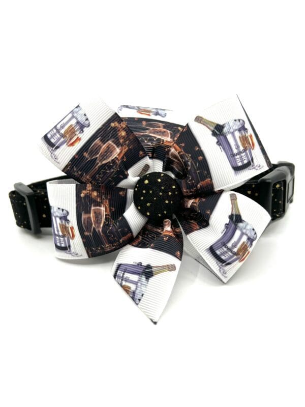 A dog collar with an image of a bottle of champagne.