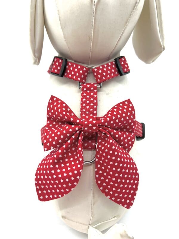 Red polka dot bow dog harness.