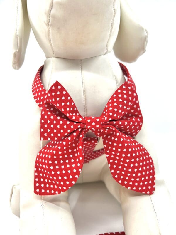 Red polka dot dog harness.