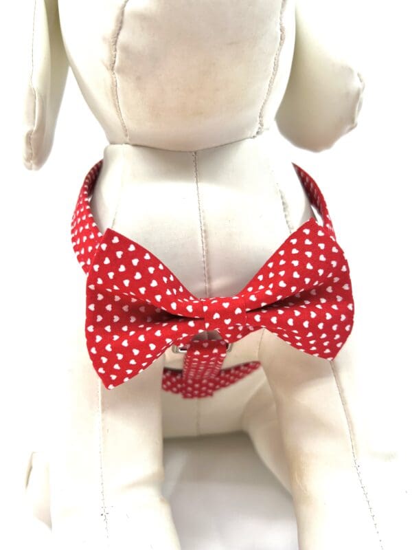 A stuffed animal wearing a bow tie.
